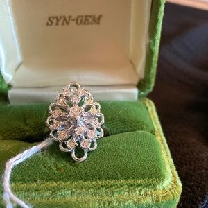 Pretty cluster ring syn-gem with 9 CZ’s size 7